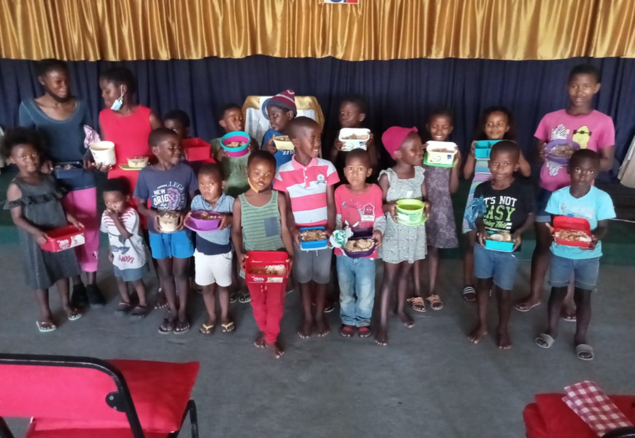 Community members receiving meals
